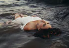 There is a unique and captivating beauty when a woman enters the water